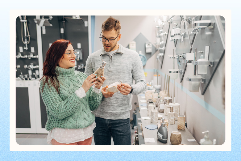 Couple shopping and looking at bathroom accessories